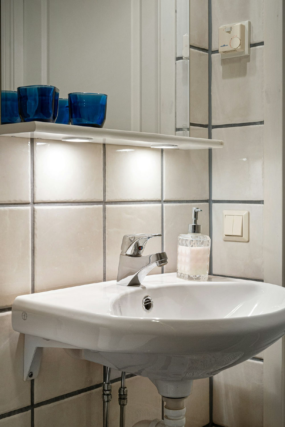 A clean white bathroom sink