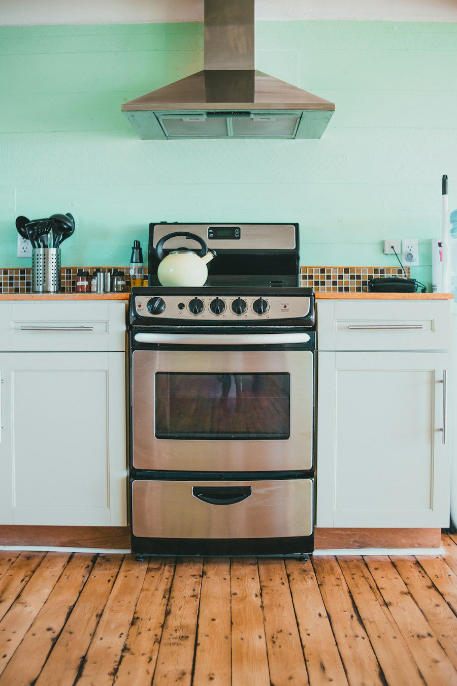 A clean stainless steel oven in a kitchen